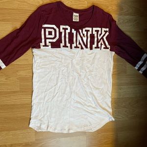 Pink 3 quarter sleeve tee. Color: Maroon & White